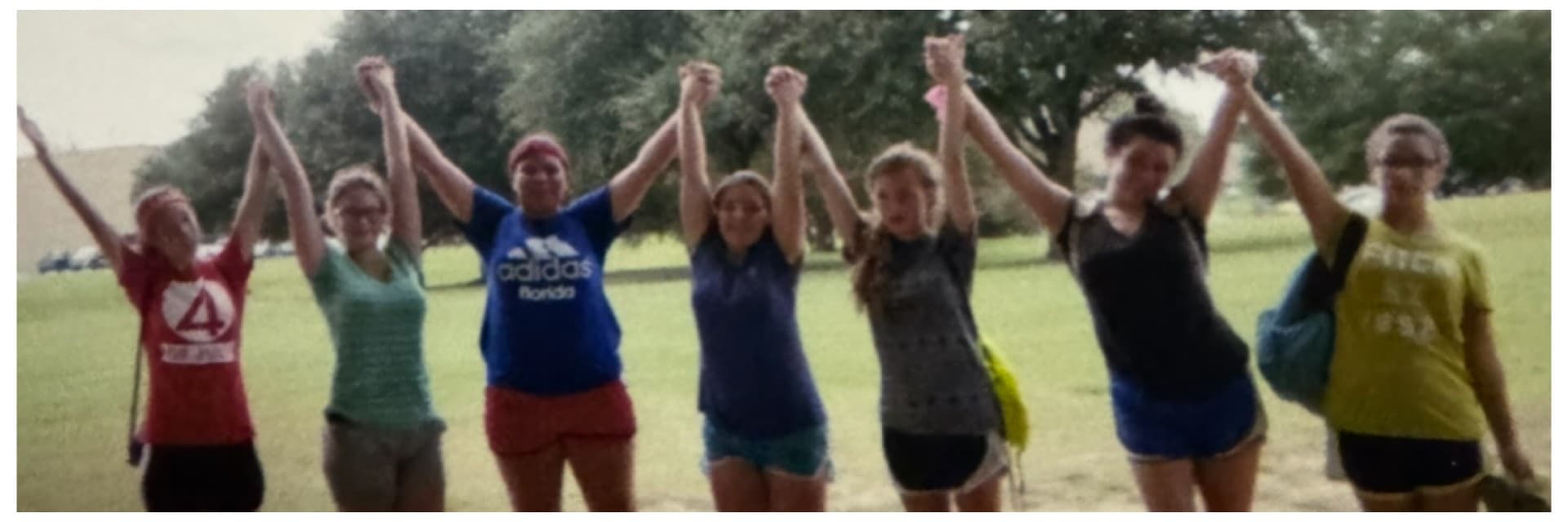 Youth group celebrating together outdoors